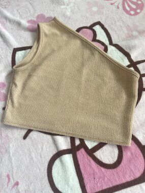 Asymmetric cream crop top